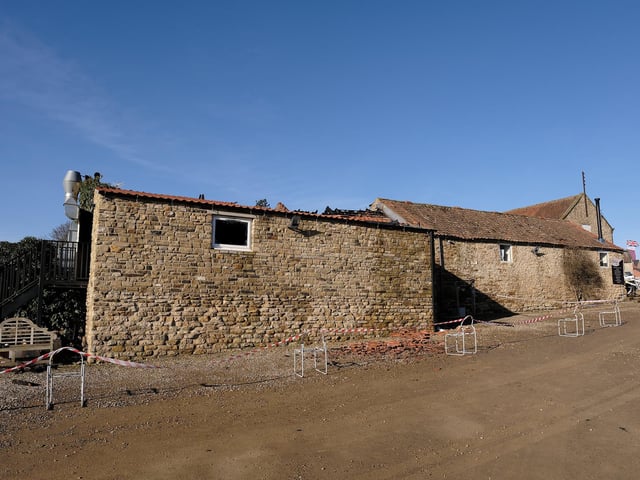 The rear of the damaged property