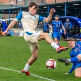 Aaron Braithwaite slides in for Whitby Town during the goalless draw at home to Radcliffe. PHOTO BY BRIAN MURFIELD