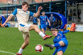 Aaron Braithwaite slides in for Whitby Town during the goalless draw at home to Radcliffe. PHOTO BY BRIAN MURFIELD