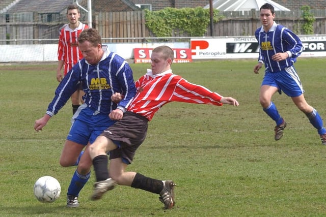 Do you know this West Pier player going in for a challenge against Normanby Hotel in the North Riding Sunday FA Cup final in 2002?