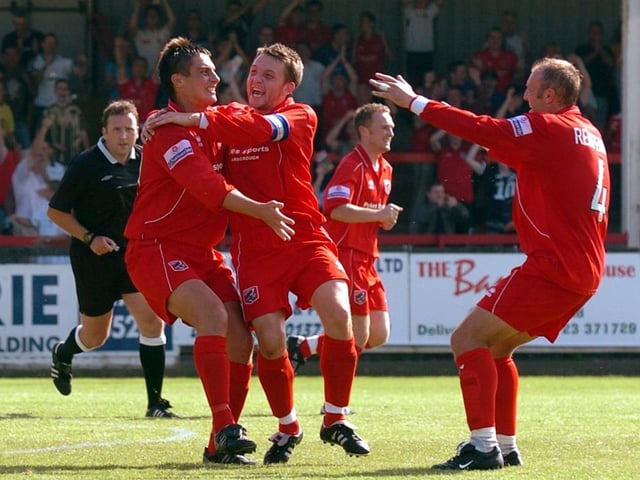 Do you recognise any of the Scarborough FC players celebrating a goal against Woking in the season opener at the McCain Stadium on August 14 in 2004?
