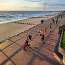 Phill Taylor leads the way along the seafront at the New Year's Day Bridlington Parkrun PHOTO BY JOHN EDWARDS