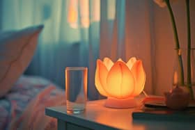 Taking a glass of water to bed and drinking if you wake in the night is a good idea, as is having a drink on waking. Photo: StockAdobe
