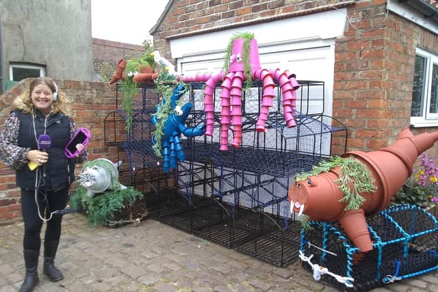 Amanda White, from BBC Radio Humberside and Look North, visited the Flamborough Flower Pot Festival.