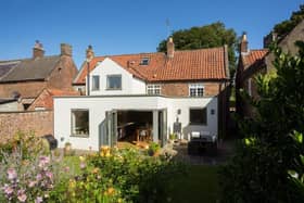 The property features easy indoor to outdoor living.