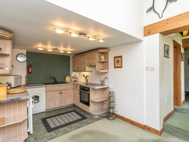 The kitchen of the cottage that forms part of the extensive property.