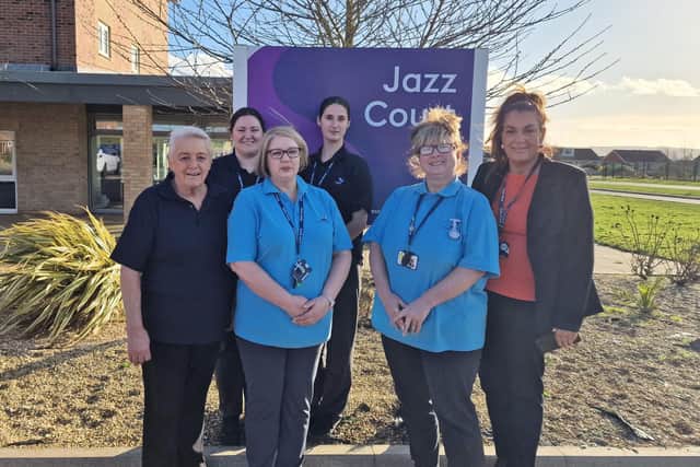 Staff members at Jazz Court