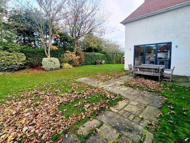 Another view of the garden and a seating area.