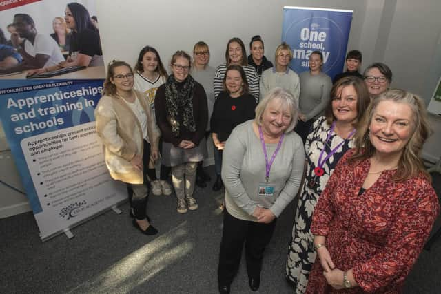 Sue Hinchcliffe, director of apprenticeships, front, with members of her team and current apprentices from Ebor’s Early Years Educator apprenticeship programme. Picture by Tim Moat