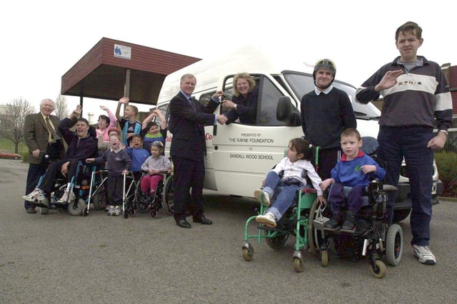 Varirty Club Chairman John Stubbs presented the keys of the new minibus for Sandall Wood School to Headteacher Carol Ray
