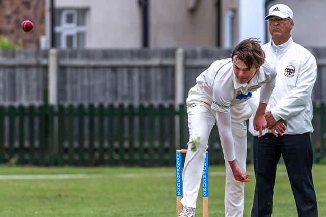 Evan Morris in bowling action for Whitby 2nds.