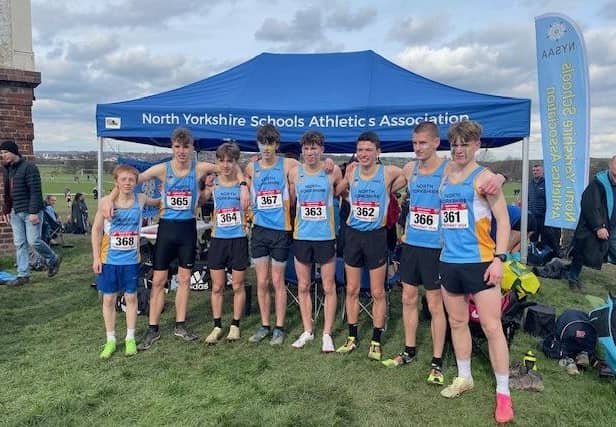 Scarborough Athletic Club's Ben Guthrie, left, lines up with the North Yorkshire team at the national cross country championships race at Pontefract.