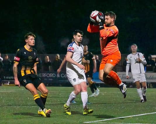 Whitby Town goalkeeper Shane Bland safely claims the ball in the 1-0 win at Morpeth Town on Tuesday night. PHOTO BY GEORGE DAVIDSON