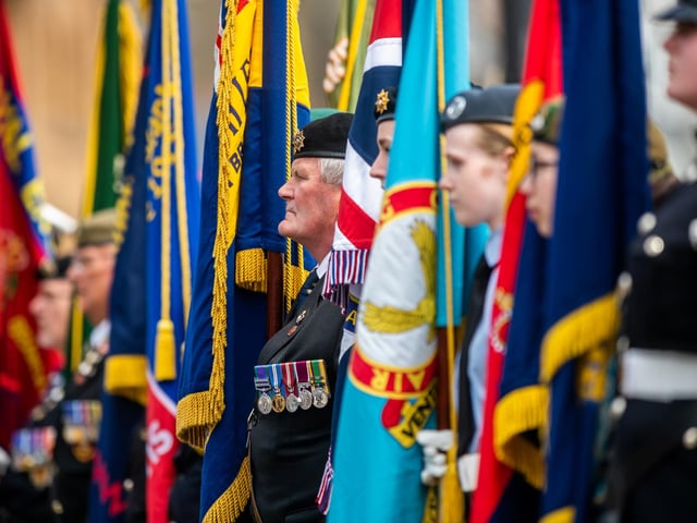 Standard-bearers line up for the start of the Scarborough Armed Forces Day.