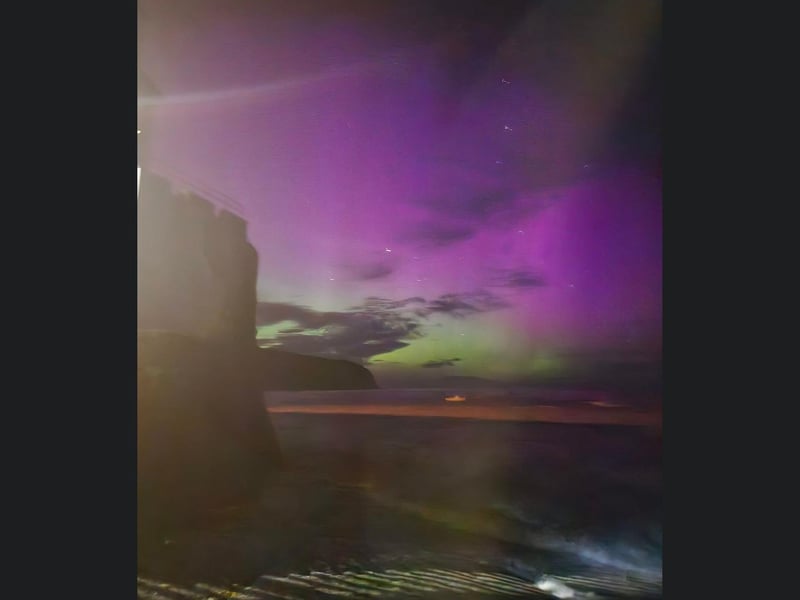 The Aurora shone as the waves crashed on a beach in Scarborough.