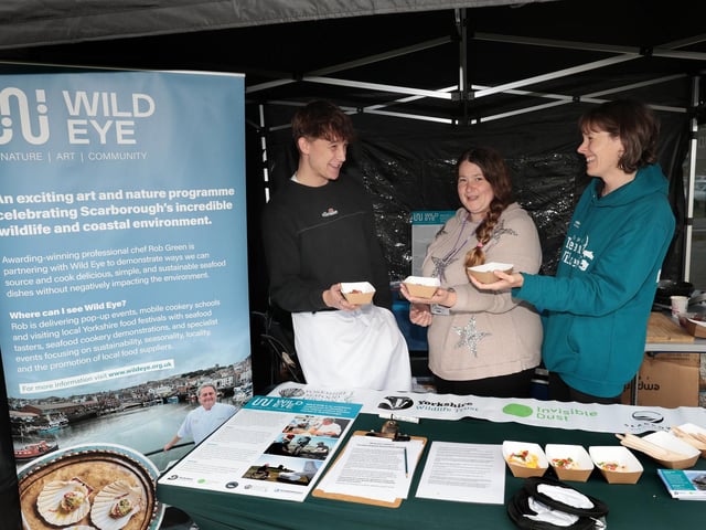 Chef Alfie Green with visitor Becky and Caroline Hill of Wild Eye sampling some food