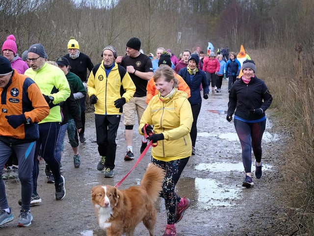 Runners dodge the puddles at the North Yorkshire Water Park one year on