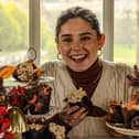 Great British Bake Off star Freya Cox, of Scarborough, with the autumn cakes she has made for Castle Howard.