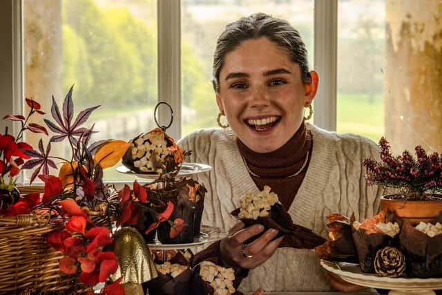 Great British Bake Off star Freya Cox, of Scarborough, with the autumn cakes she has made for Castle Howard.
