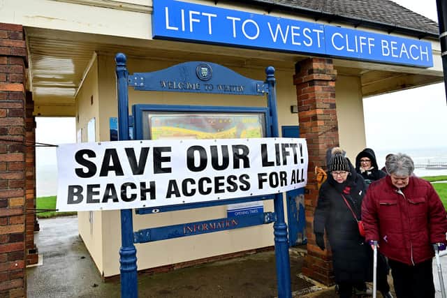 The Save Our list signed posted outside the lift. photo: Richard Ponter