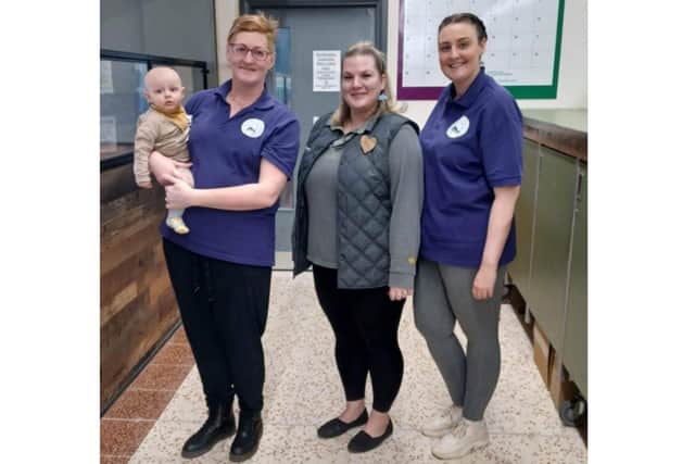 Kate, Abi and baby Toby from New Pasture Lane Community Centre with Rebecca, Community Champion at the Morrisons store in Bridlington.