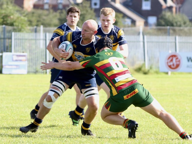Selby try to halt a Bridlington run.