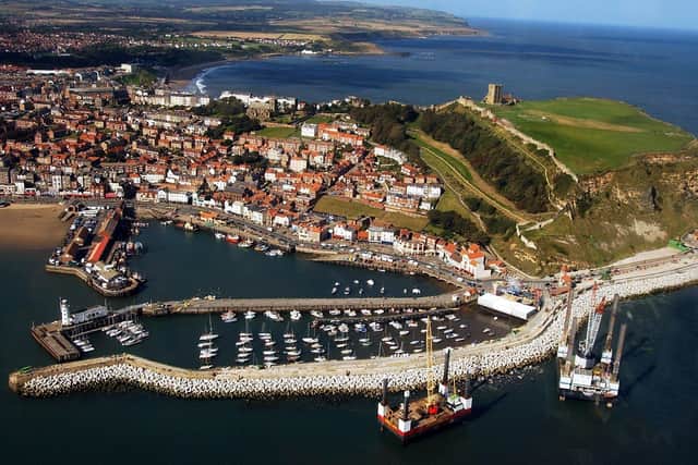 Scarborough Harbour and South Bay on the East Coast taken from the Tucano aircroft flown from RAF Linton on Ouse. 20th September 2004 (Tech Data Nikon D1h camera, 24-120mm lens, exposure 2000th sec at f5.6, iso 400)