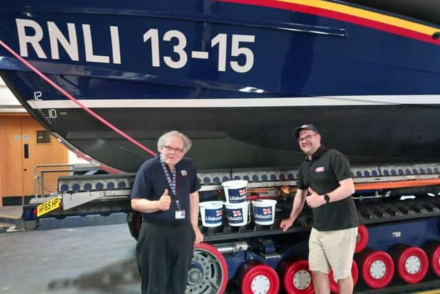 Scarborough RNLI visits Officer John Porter with Central Tramway general manager Colin Powell - Image: RNLI/Alan Hargreaves