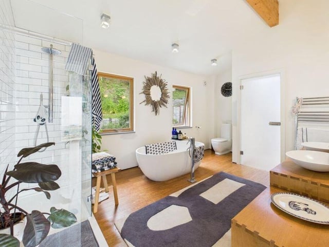 The property has three luxurious bathrooms.