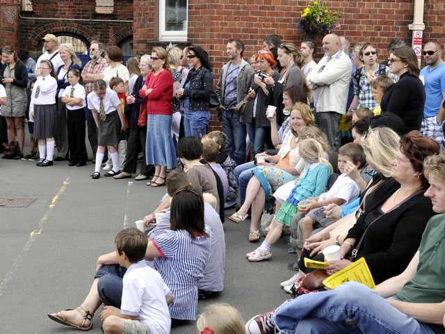 Gladstone Road Junior School marks its 120th anniversary - parents ,staff and teachers enjoying the Maypole dancing.
102894g