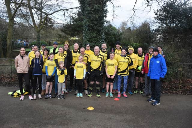 Bridlington Road Runners members show off their club colours in tribute to fellow member David Pring's father. PHOTO BY TCF PHOTOGRAPHY