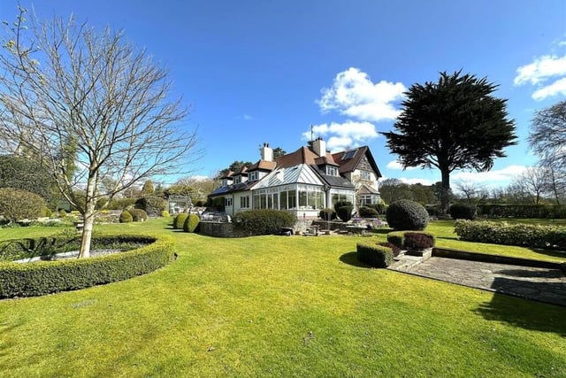 Looking back at the house from its landscaped gardens.