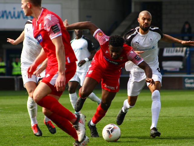 Boro man of the match Kieran Weledji goes to ground.
