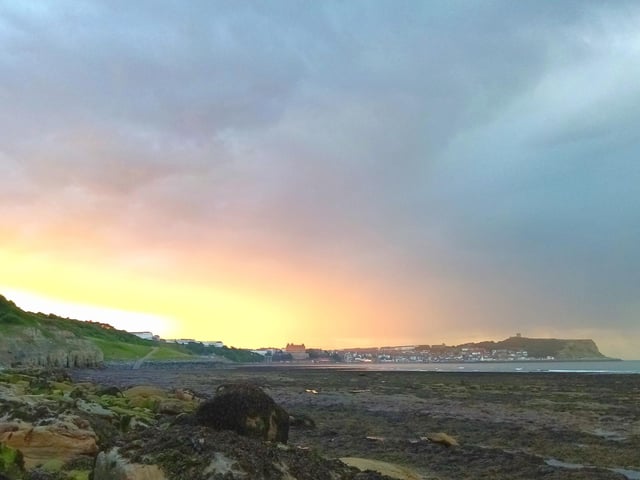 Pastel sunrise and storm clouds.