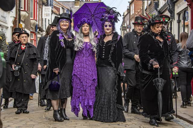 Old school friends Jackie Stewart, Lesley Marsh and Trish Robinson meet up on Church Street for Whitby Goth weekend. 
Picture Tony Johnson