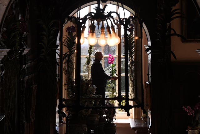 Head Gardener preparing the Hall for the festivities.