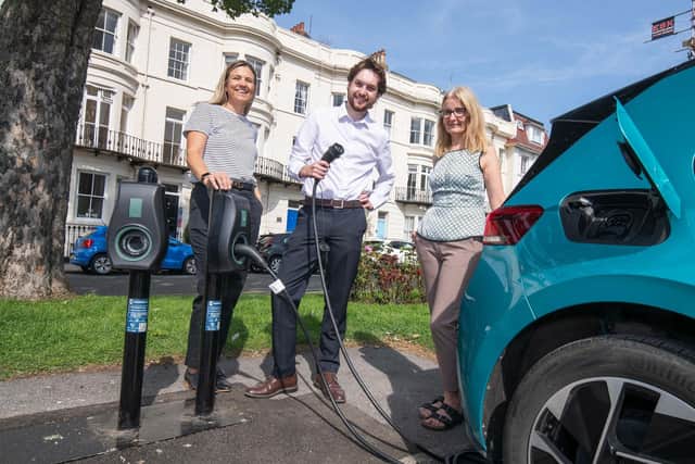 : From left, Kellie Lane, account manager at Connected Kerb, Harry Baross, climate change manager at North Yorkshire Council, and Jane Wilson, deputy parking manager at North Yorkshire Council. They are stood in Albion Road car park in Scarborough, where electric vehicle chargers have been installed.