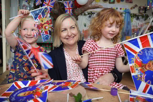 Alison Hulme MP celebrates with the children.