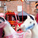 Youngsters on the fairground rides at Malton Christmas Market.
picture: Richard Ponter