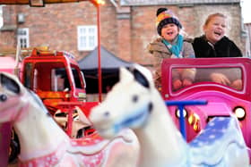 Youngsters on the fairground rides at Malton Christmas Market.
picture: Richard Ponter