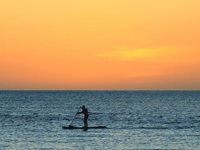 Lone paddle boarder.