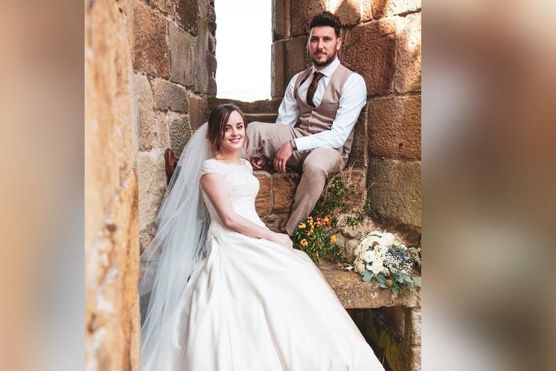 Happy couple celebrate wedding at Danby Castle.
picture: Discovery Photography.