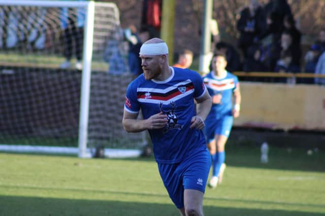 A bandaged Jason Kennedy pushes on for the leveller for Blues. Photo by Owen Cox