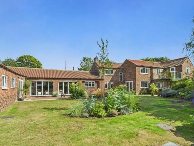 The rear aspect of the attractive property.