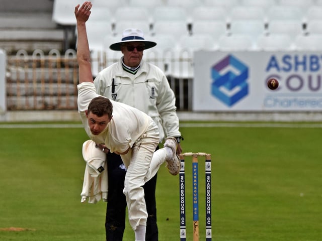 Alex Burton bowls for Scarborough CC.