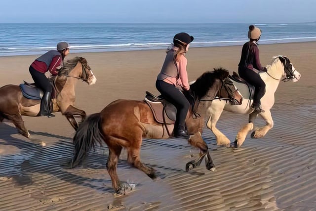 Fyling Hall students enjoy a horse ride on the beach.