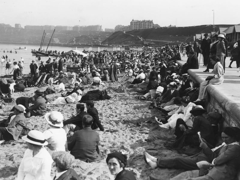 circa 1919: Holidaymakers on the beach at the North Bay in Scarborough. (Photo by Hulton Archive/Getty Images)