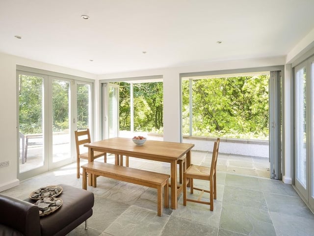 The property has three reception rooms where the family can sit, watch TV while heating up in front of the fireplace.