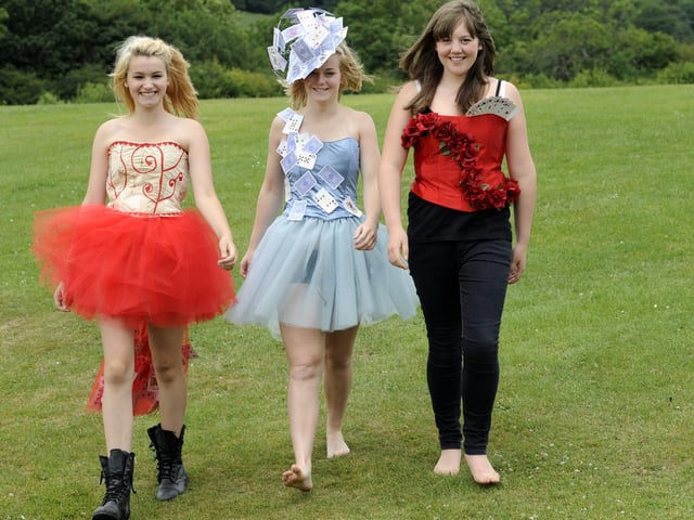 Graham School fashion show on the theme of Alice (in Wonderland). Ready for the catwalk are Megan Jepson (L), Lucy Sayers and Georgiana Robertson, stepping out in their own designs. 102818e
