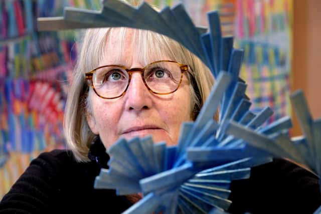 Sally Gorham views one of the sculptures at the exhibition at the Old Parcels Office